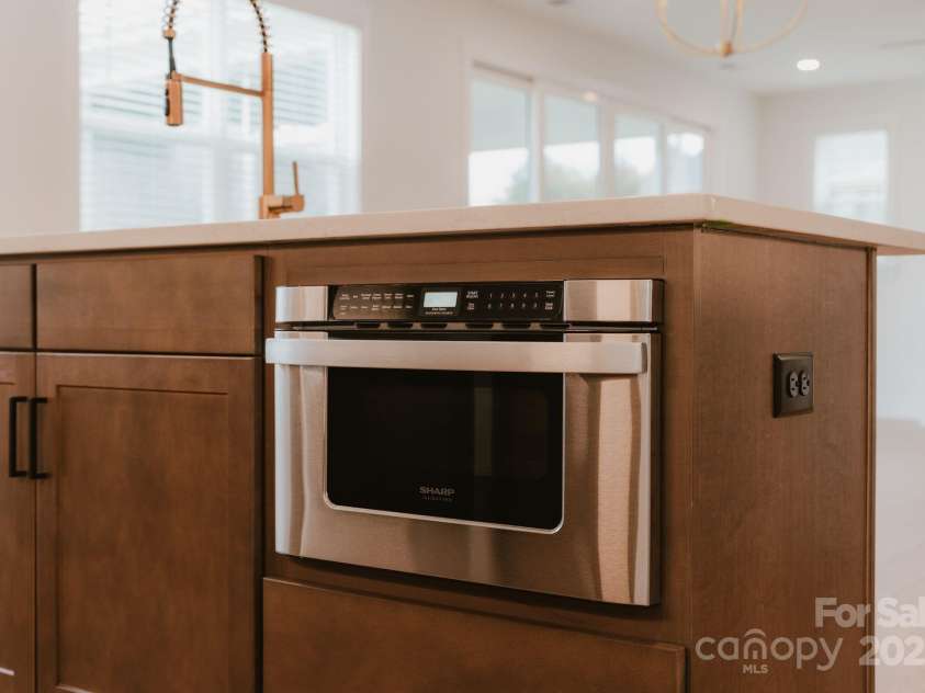 817 Garringer Place, Charlotte, NC 28208.  MLS# CAR4253166, YatesRealty ID 10434. Picture is an example of package finishes available