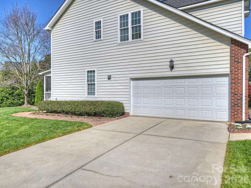 15485 Donnington Drive, Charlotte, NC 28277.  MLS# CAR4365294, YatesRealty ID 10441. Side Load 2-Car Garage