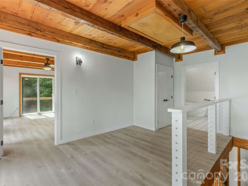 1679 Woods Mountain Trail, Cullowhee, NC 28723.  MLS# CAR4341521, YatesRealty ID 10442. 