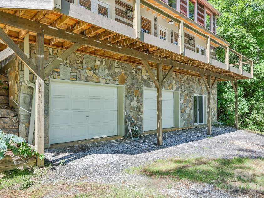 1679 Woods Mountain Trail, Cullowhee, NC 28723.  MLS# CAR4341521, YatesRealty ID 10442. 