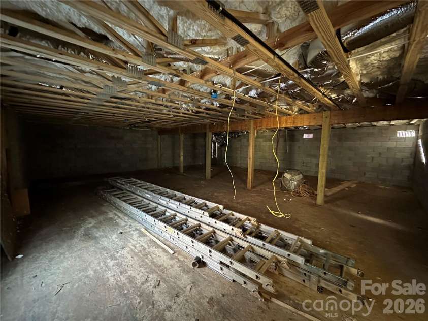 133 Appalachian Way, Asheville, NC 28806.  MLS# CAR4325107, YatesRealty ID 10443. Unfinished basement area accessible from outside