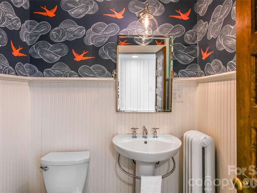 165 Macon Avenue, Asheville, NC 28801.  MLS# CAR4268052, YatesRealty ID 10445. The main level powder