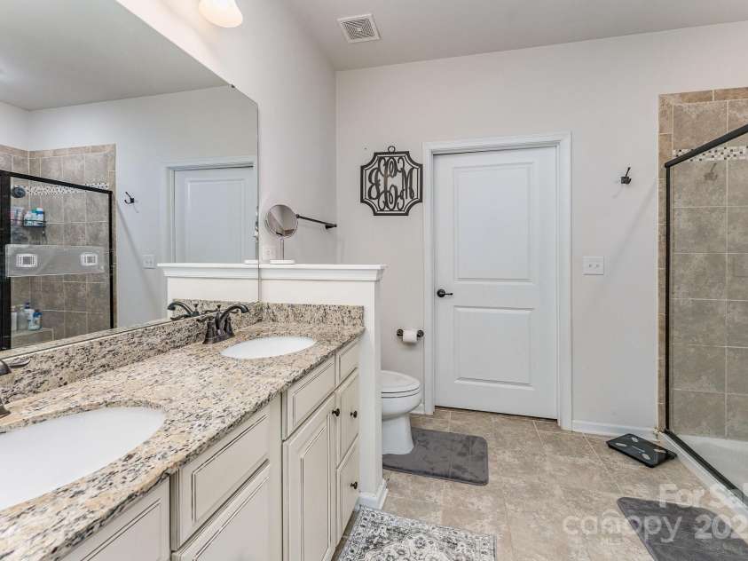 11062 Discovery Drive, Concord, NC 28027.  MLS# CAR4249745, YatesRealty ID 10447. Primary bathroom