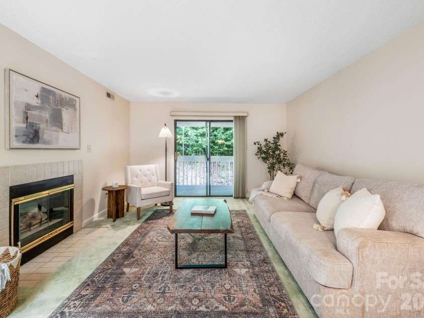 2604 Vineyard Boulevard, Asheville, NC 28805.  MLS# CAR4388776, YatesRealty ID 10449. Gas Fireplace in living room