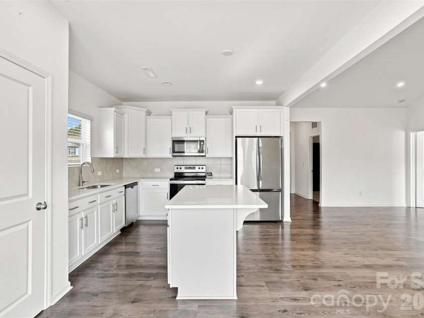 2502 Waverly Drive, Monroe, NC 28112.  MLS# CAR4416414, YatesRealty ID 10450. Kitchen/Living Room