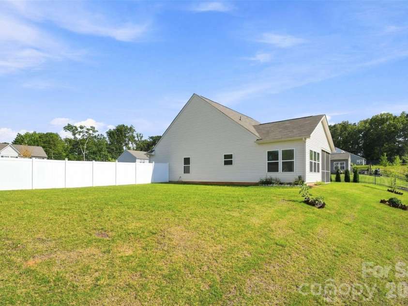 2502 Waverly Drive, Monroe, NC 28112.  MLS# CAR4416414, YatesRealty ID 10450. Side Yard