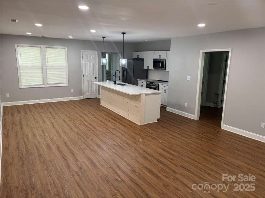 704 Guinn Street, Clover, SC 29710.  MLS# CAR4251904, YatesRealty ID 10453. Great Room / Kitchen