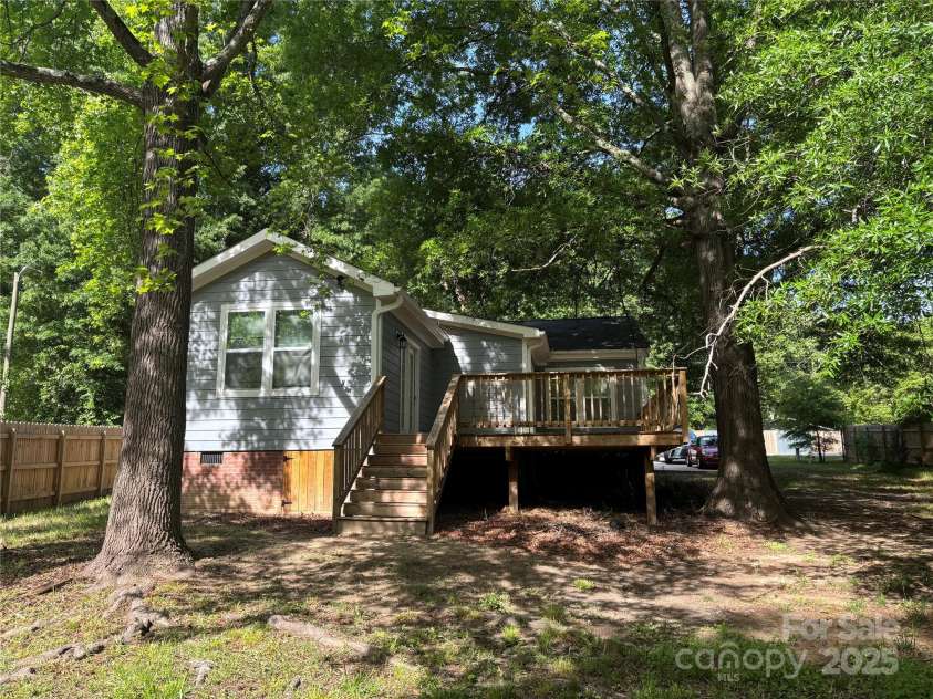 704 Guinn Street, Clover, SC 29710.  MLS# CAR4251904, YatesRealty ID 10453. Rear Elevation and Deck