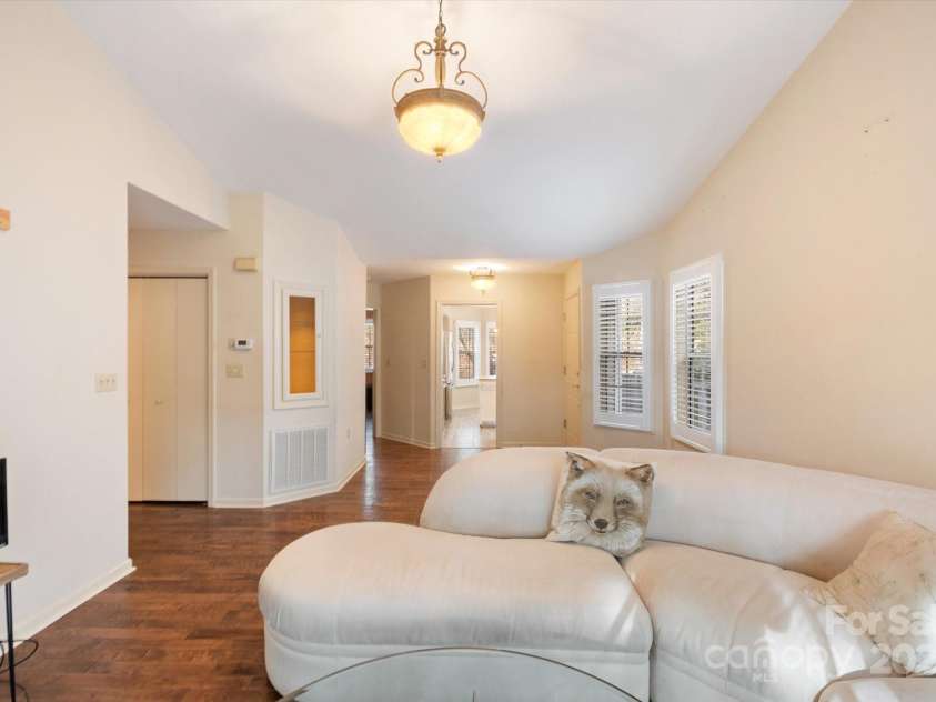 870 Park Place, Hendersonville, NC 28791.  MLS# CAR4206415, YatesRealty ID 10456. Living room looking towards the kitchen.
