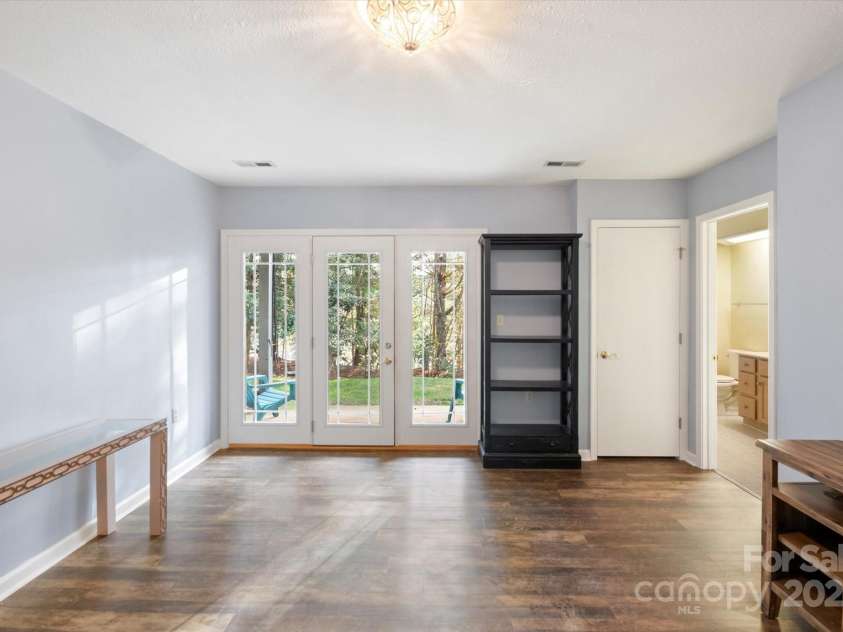 870 Park Place, Hendersonville, NC 28791.  MLS# CAR4206415, YatesRealty ID 10456. Lower Level Room with Walk Out Patio