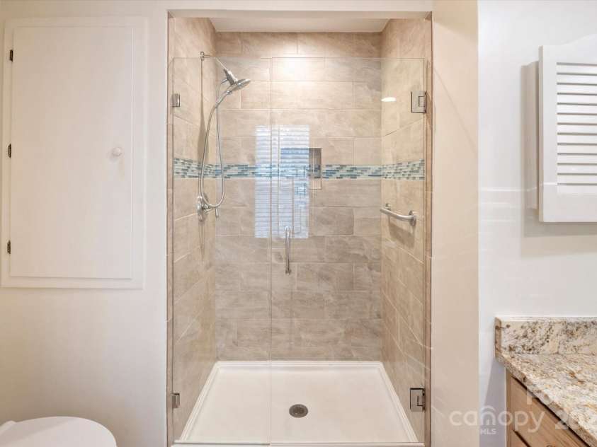 870 Park Place, Hendersonville, NC 28791.  MLS# CAR4206415, YatesRealty ID 10456. Primary Bathroom Shower