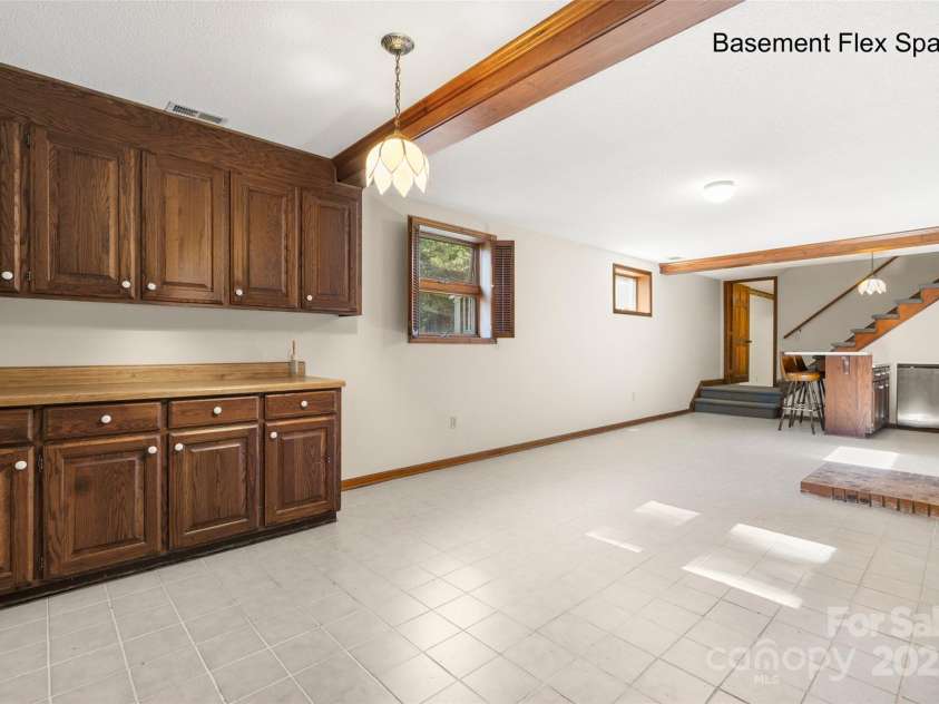 5303 Rogers Road, Monroe, NC 28110.  MLS# CAR4312504, YatesRealty ID 1046. Built in, custom cabinetry 