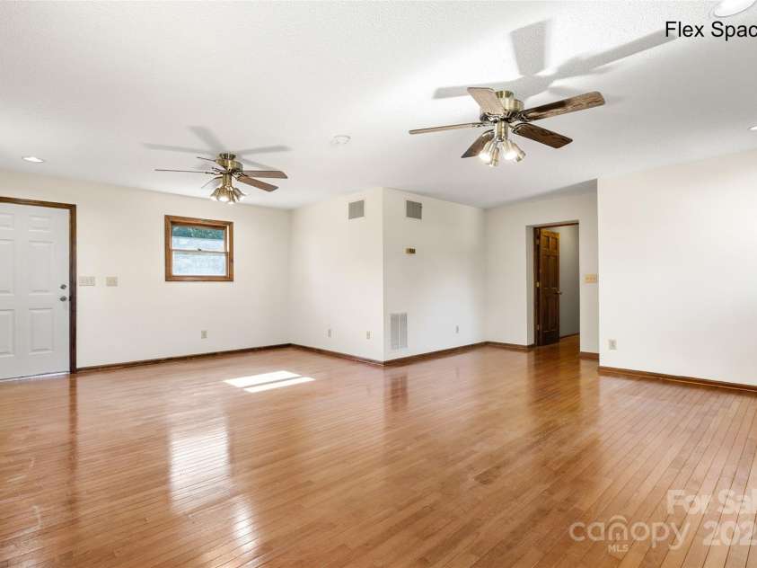 5303 Rogers Road, Monroe, NC 28110.  MLS# CAR4312504, YatesRealty ID 1046. Great room 