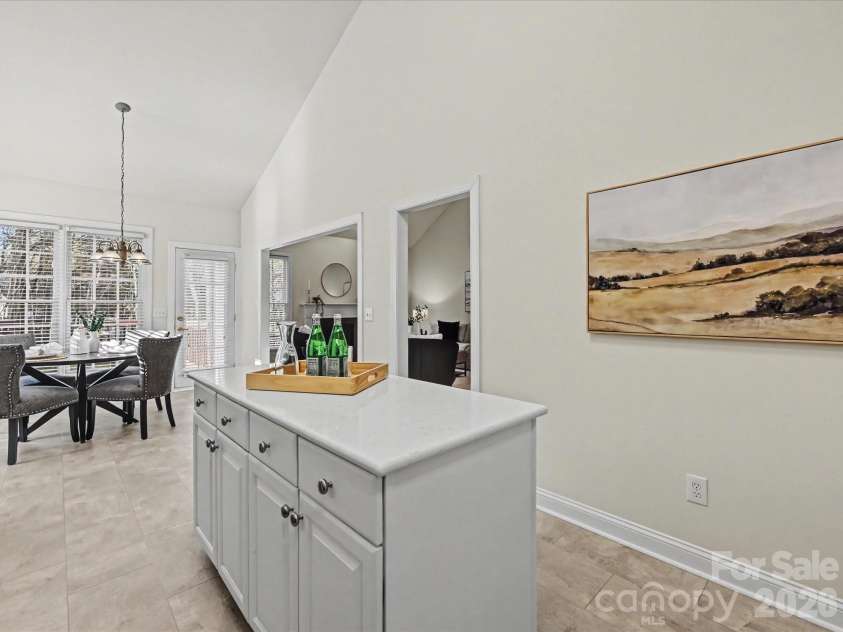 306 Ashby Drive, Davidson, NC 28036.  MLS# CAR4358205, YatesRealty ID 10461. Extra storage and counter space in the island