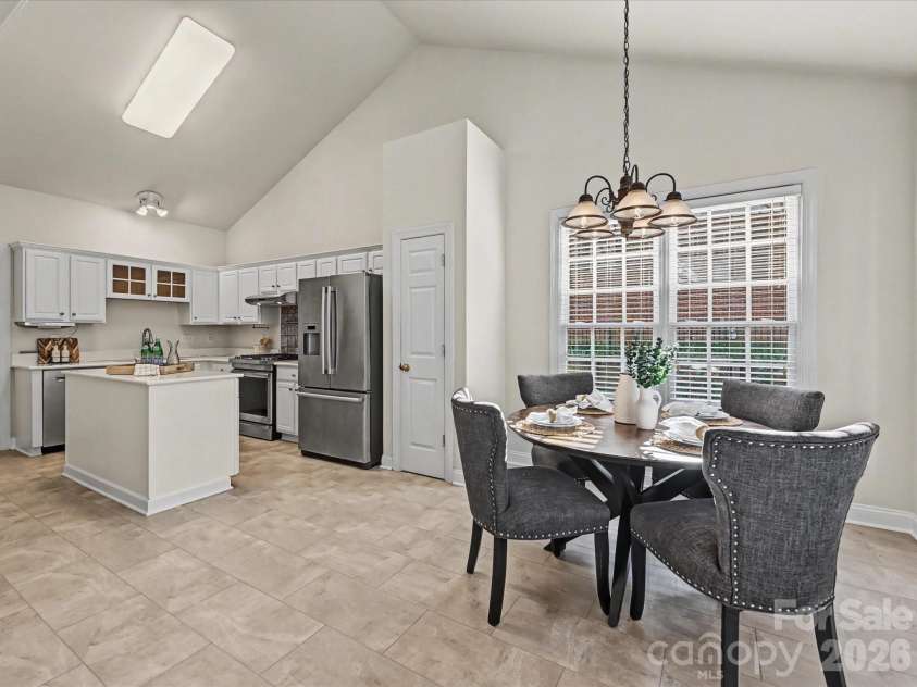 306 Ashby Drive, Davidson, NC 28036.  MLS# CAR4358205, YatesRealty ID 10461. New LVT flooring in the Kitchen, Laundry Room and Breakfast area