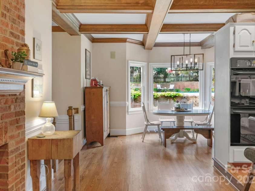 5750 Hemby Road, Matthews, NC 28104.  MLS# CAR4243817, YatesRealty ID 10461. Fireplace in Kitchen