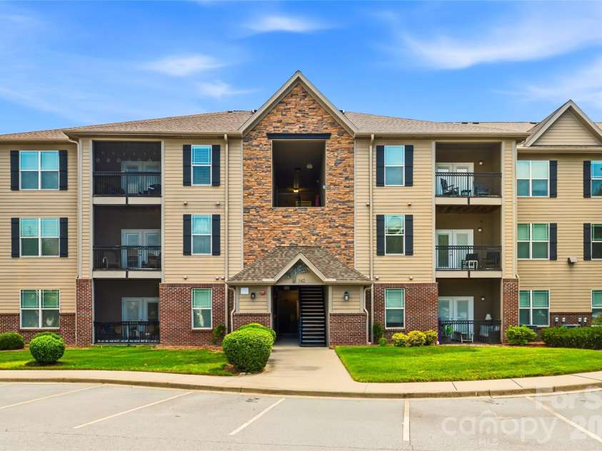 142 Brickton Village Circle, Fletcher, NC 28732.  MLS# CAR4391432, YatesRealty ID 10465. Elevator Access - Brickton Village 202