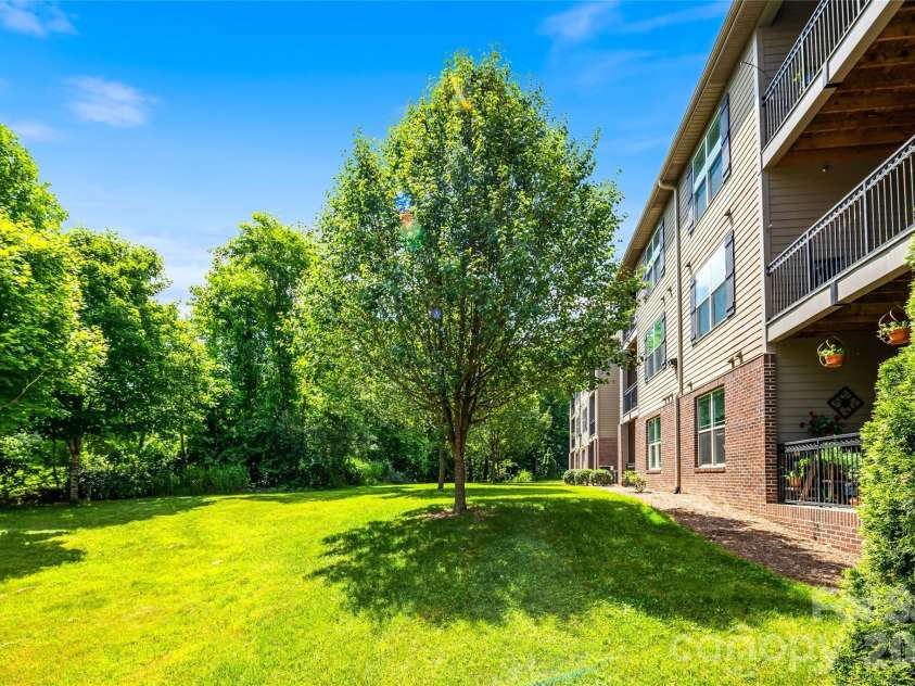 142 Brickton Village Circle, Fletcher, NC 28732.  MLS# CAR4391432, YatesRealty ID 10465. Your green space view