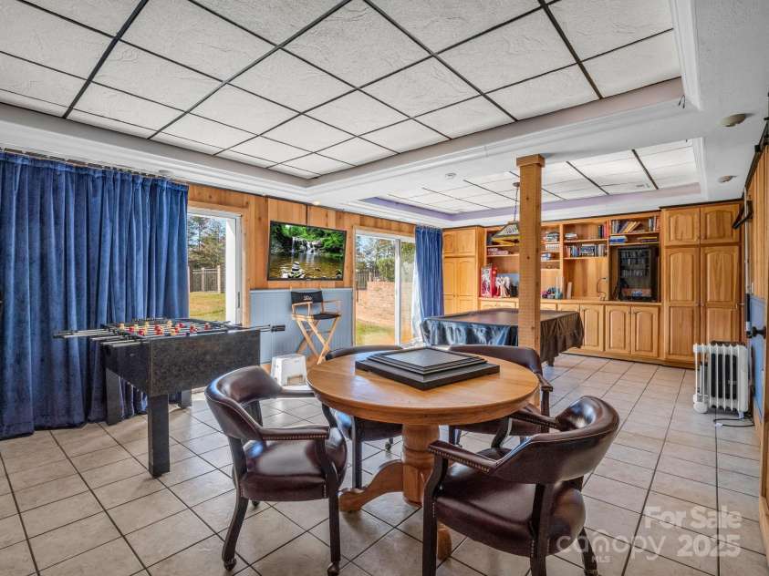 1102 Mountain Road, Bostic, NC 28018.  MLS# CAR4318780, YatesRealty ID 1047. Basement gameroom