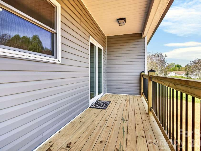 144 Tranquility Lane, Harmony, NC 28634.  MLS# CAR4366064, YatesRealty ID 10470. Covered back porch