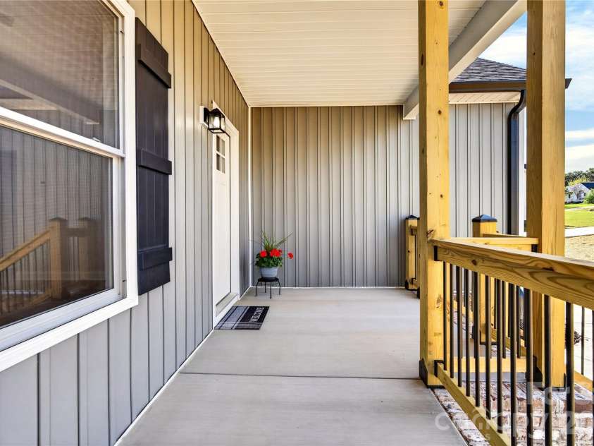 144 Tranquility Lane, Harmony, NC 28634.  MLS# CAR4366064, YatesRealty ID 10470. Front porch