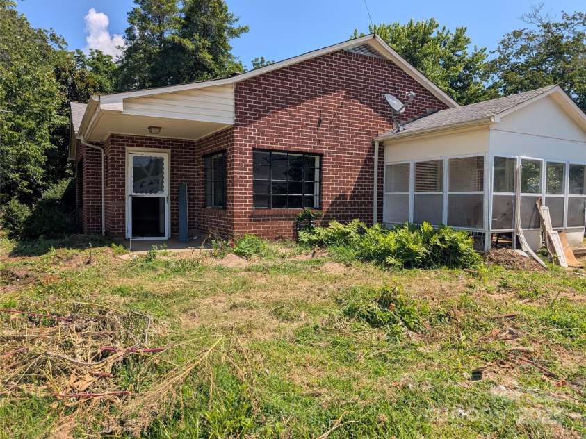203 Catawba Avenue, Old Fort, NC 28762.  MLS# CAR4252894, YatesRealty ID 10474. Side of property
