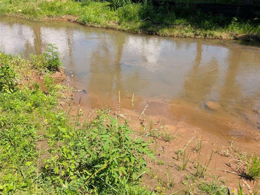 203 Catawba Avenue, Old Fort, NC 28762.  MLS# CAR4252894, YatesRealty ID 10474. View of town and creek