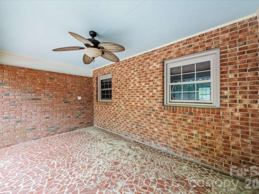 207 Williamsburg Lane, Wadesboro, NC 28170.  MLS# CAR4364530, YatesRealty ID 10474. Back Patio