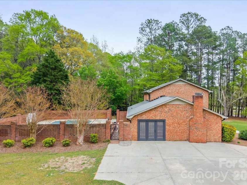 207 Williamsburg Lane, Wadesboro, NC 28170.  MLS# CAR4364530, YatesRealty ID 10474. Side View