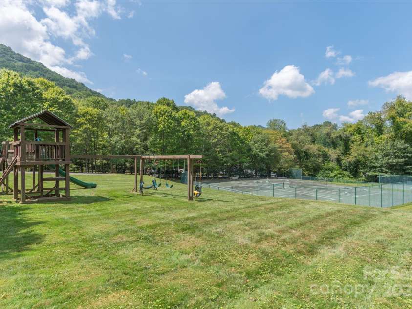 186 Timucua Trail, Waynesville, NC 28786.  MLS# CAR4254132, YatesRealty ID 10475. Community Tennis/Pickelball Courts and Playground.
