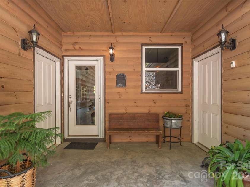 186 Timucua Trail, Waynesville, NC 28786.  MLS# CAR4254132, YatesRealty ID 10475. Covered Entrance.