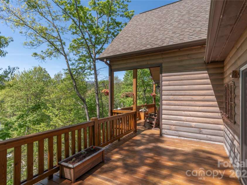 186 Timucua Trail, Waynesville, NC 28786.  MLS# CAR4254132, YatesRealty ID 10475. Deck off of 3rd bedroom/office.