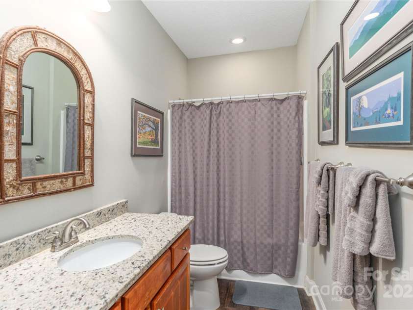 186 Timucua Trail, Waynesville, NC 28786.  MLS# CAR4254132, YatesRealty ID 10475. Guest bath with tub.