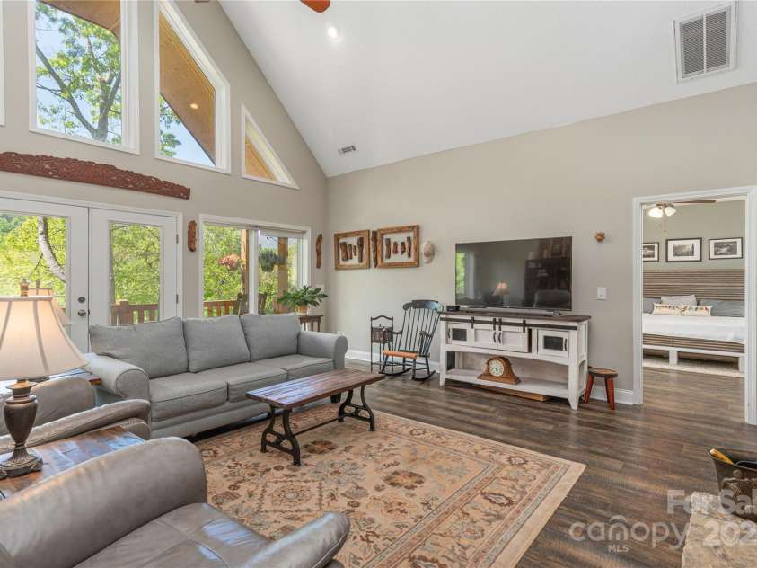 186 Timucua Trail, Waynesville, NC 28786.  MLS# CAR4254132, YatesRealty ID 10475. Windows bring nature inside.