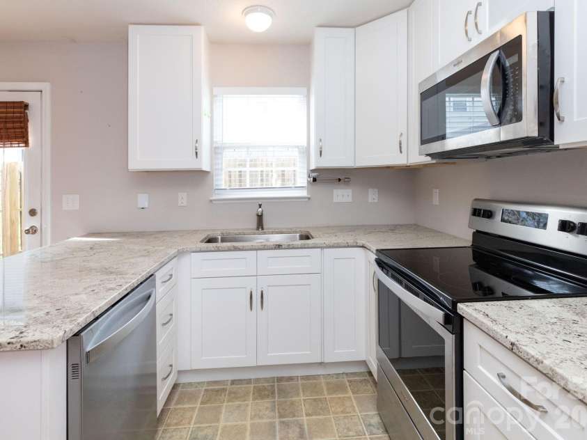 30 Chesire Way, Fletcher, NC 28732.  MLS# CAR4363871, YatesRealty ID 10475. Kitchen