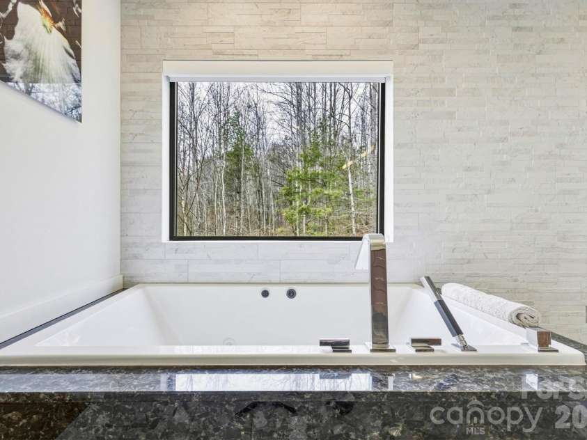 1416 High Valley Way, Lenoir, NC 28645.  MLS# CAR4353473, YatesRealty ID 10476. Primary bedroom extra large tub