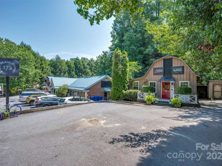 172 formerly 153 Main Street, Saluda, NC 28773.  MLS# CAR4225037, YatesRealty ID 1048. 4+ parking spaces and more when parking in tandem