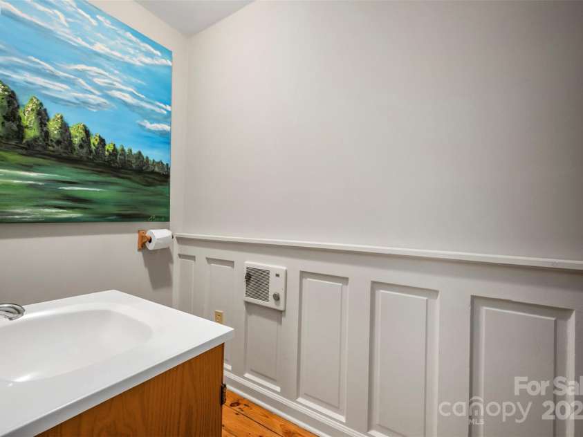 172 formerly 153 Main Street, Saluda, NC 28773.  MLS# CAR4225037, YatesRealty ID 1048. Bathroom has a shower stall.