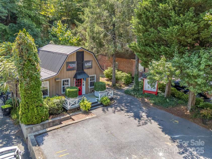 172 formerly 153 Main Street, Saluda, NC 28773.  MLS# CAR4225037, YatesRealty ID 1048. Outside kiosk for advertising and announcements.