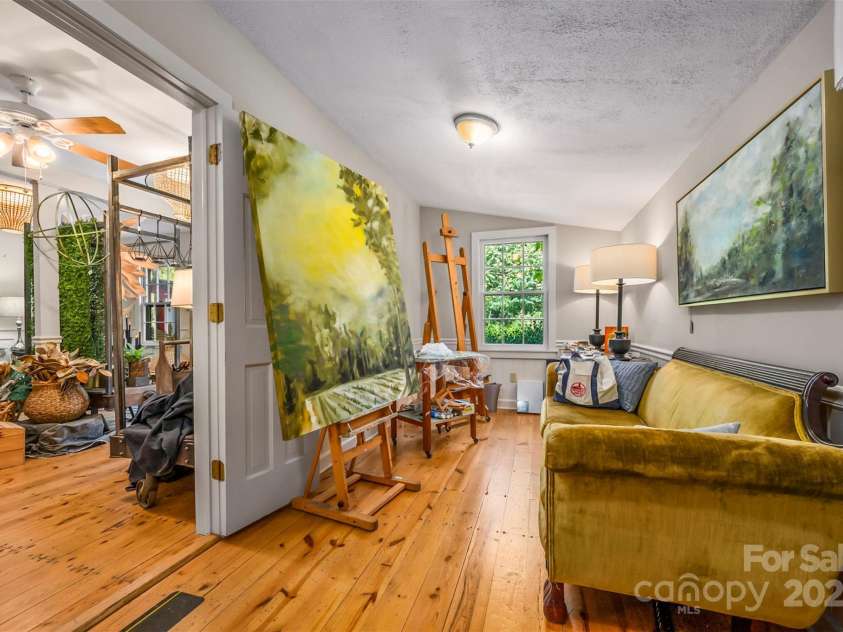 172 formerly 153 Main Street, Saluda, NC 28773.  MLS# CAR4225037, YatesRealty ID 1048. This is one end of the additional room that can be used for office or retail display.