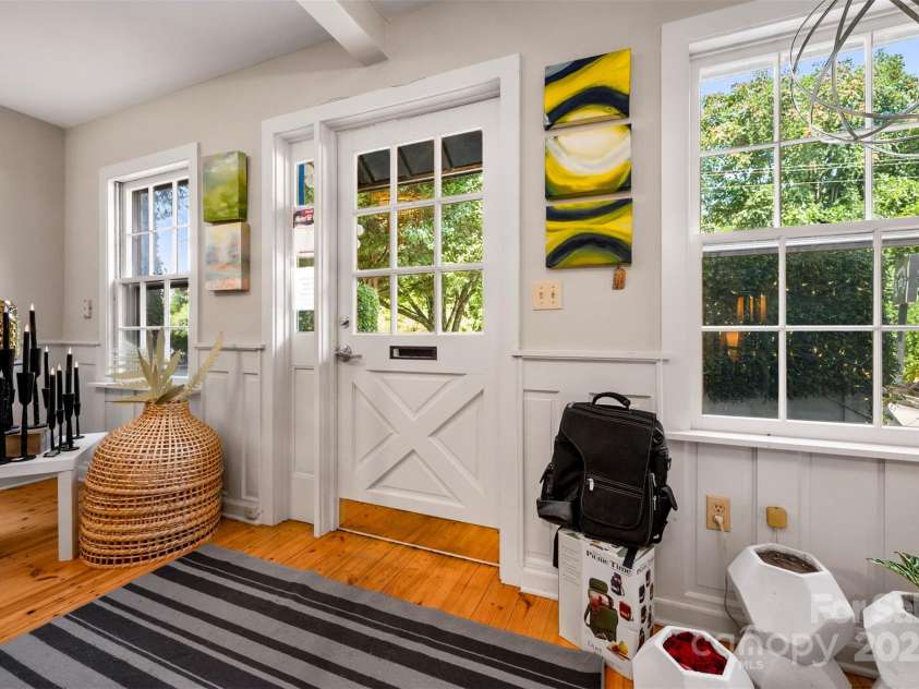 172 formerly 153 Main Street, Saluda, NC 28773.  MLS# CAR4225037, YatesRealty ID 1048. Use large front room as reception area or display room