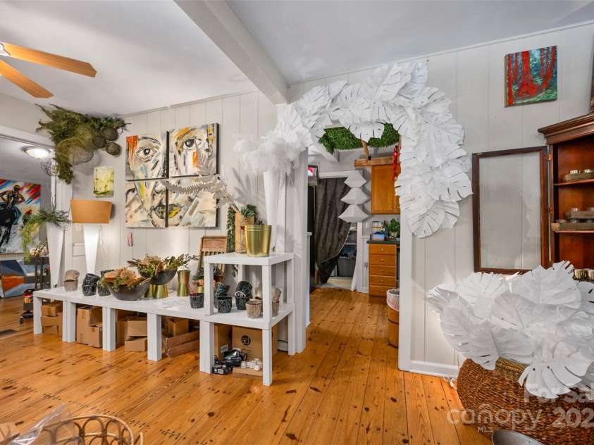 172 formerly 153 Main Street, Saluda, NC 28773.  MLS# CAR4225037, YatesRealty ID 1048. View from front room looking into breakroom and additional office or retail display space.