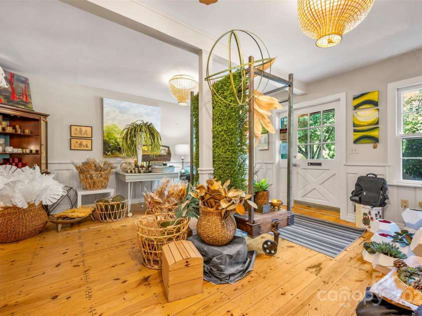 172 formerly 153 Main Street, Saluda, NC 28773.  MLS# CAR4225037, YatesRealty ID 1048. View looking into front room from the large side space.