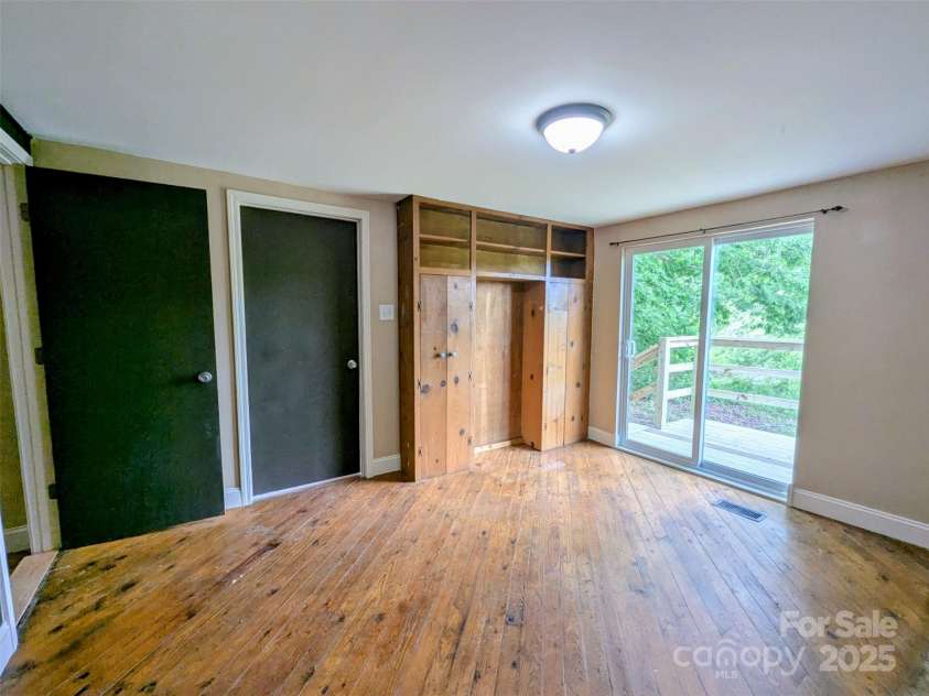 2991 Brad Deal Road, Valdese, NC 28690.  MLS# CAR4254989, YatesRealty ID 10492. Primary bedroom with deck