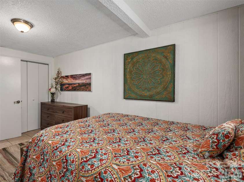 116 Vehorn Road, Fairview, NC 28730.  MLS# CAR4345277, YatesRealty ID 10496. Lower Level Sleeping Area