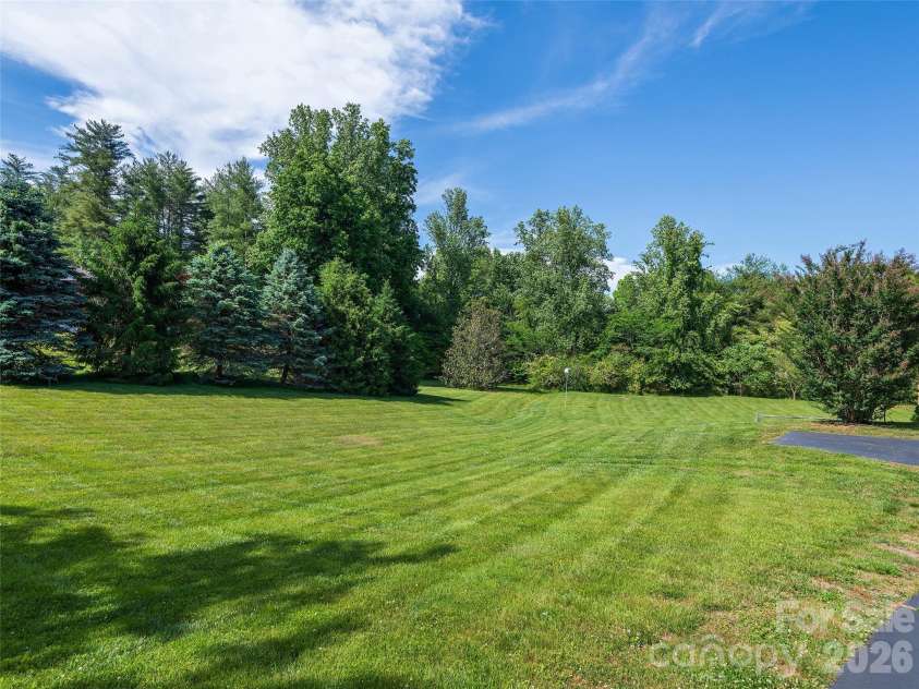 39 Beaumont Drive, Hendersonville, NC 28739.  MLS# CAR4385271, YatesRealty ID 10499. Back yard