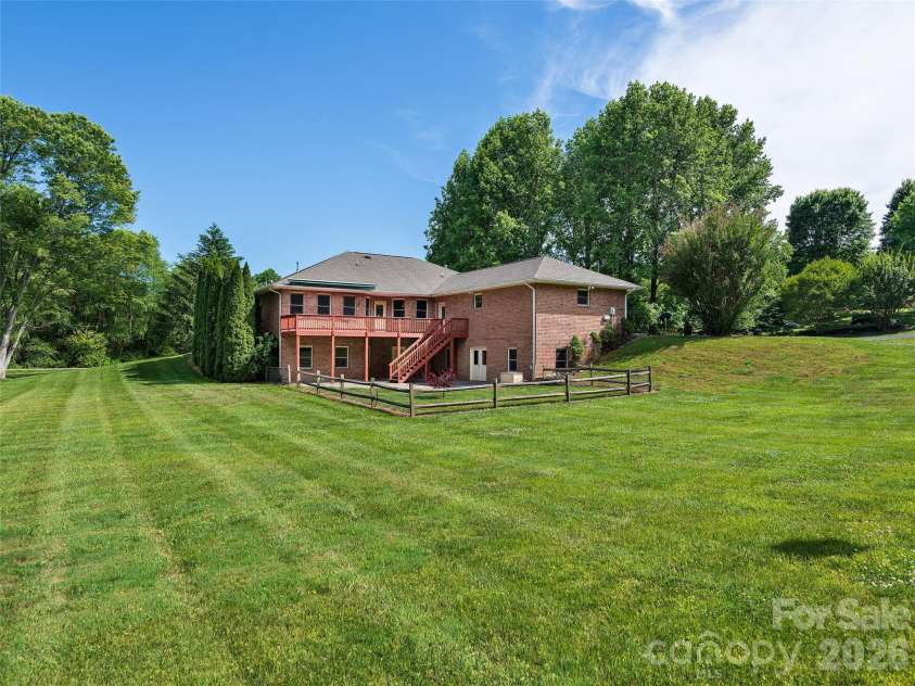 39 Beaumont Drive, Hendersonville, NC 28739.  MLS# CAR4385271, YatesRealty ID 10499. Back yard
