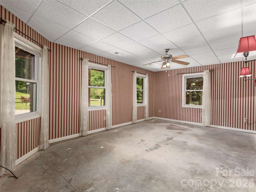 39 Beaumont Drive, Hendersonville, NC 28739.  MLS# CAR4385271, YatesRealty ID 10499. Guest room in basement.  Only lacking flooring to be finished