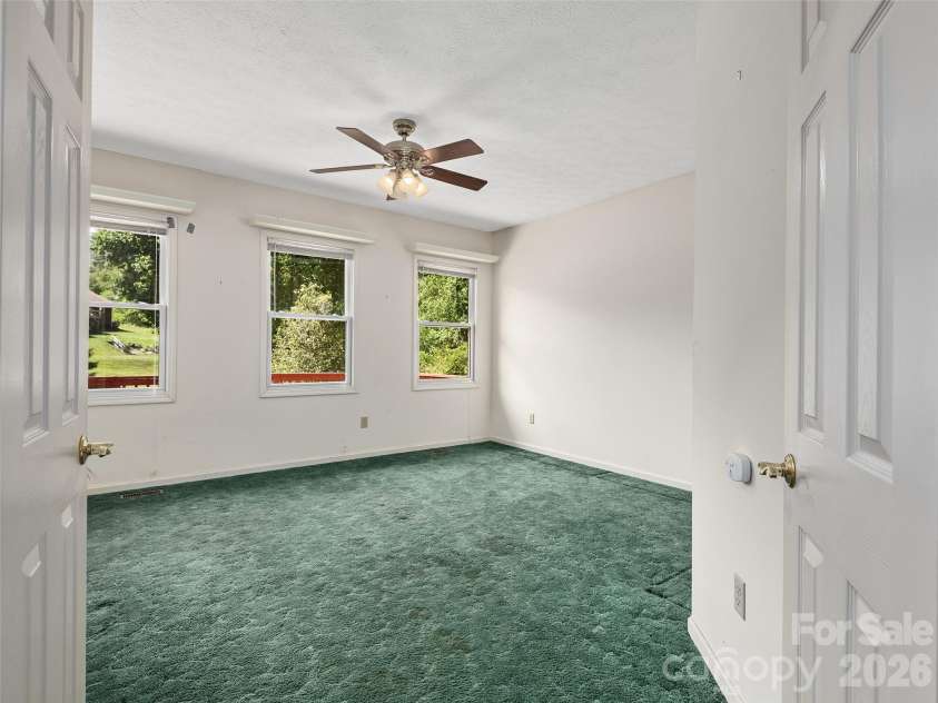 39 Beaumont Drive, Hendersonville, NC 28739.  MLS# CAR4385271, YatesRealty ID 10499. Office off of Primary Bedroom