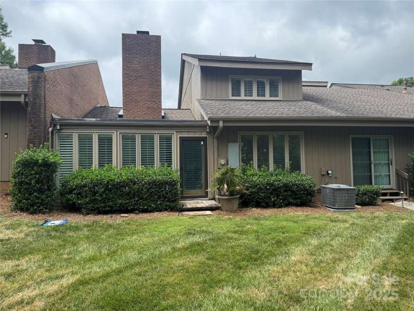 4909 Torrey Pines Court, Charlotte, NC 28226.  MLS# CAR4284066, YatesRealty ID 105. Back of Townhouse